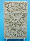 A 19thC Chinese carved ivory card case carved with figural decoration (11.5 x 7.5 x 1.