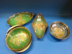 A collection of Carlton ware in the Mikado / Pagoda pattern against green and aqua grounds