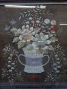 An early 20thC framed and glazed work of a basket of flowers