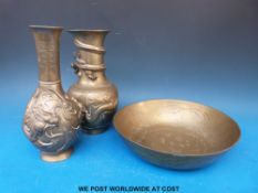 Two Chinese bronze vases with dragon decoration together with a bowl