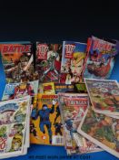 A collection of annuals and comics to include 'Battle' 1983, 84, 85, Victor 1983 and '2000 AD'.