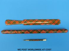 A McPherson tartan ware scroll case, a letter opener and a propelling pencil,