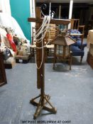 An oak adjustable floor standing hanging or standard lamp