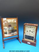 A small swing frame dressing table mirror and an American mantel clock