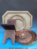 A collection of Eastern trays and carved book safe,