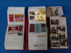 A collection of British and foreign cigarette packets in two albums and three sets of 1930s