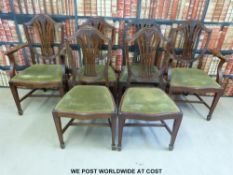 A set of five Chippendale style dining chairs together with a similar chair