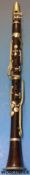 A 19thC rosewood clarinet in original case by Butler, Haymarket London.