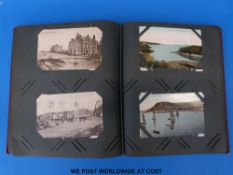 An album of postcards to include Bournemouth, Carmarthen, Swansea, Goodrick Sands, Aberystwyth,