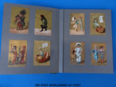 A late 19thC scrap album containing trade cards including many gilt examples, French, monkeys,