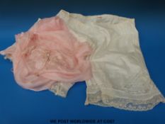 A pair of pink silk embroidered bloomers together with a matching undergarment and two further