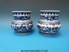 A near pair of fine Chinese blue and white leys jars,