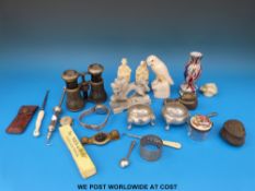 A tray of collectable items including French field glasses, hat pins, onyx dragon,