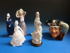 Royal Doulton Long John Silver D6335 character jug, together with two Lladro figures,