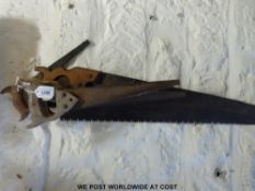 Four vintage saws to include a superior example and other wood saws