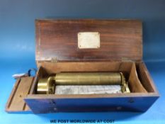 A cylinder musical box by 'Henriot' of Geneva c1850 in a plain case with drop down flap covering