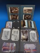 A collection of postcards in albums including humorous, topographical,