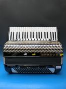 A Hohner Atlantic IV N 'Musette' 120 bass, eleven couplers to treble, two to bass side,