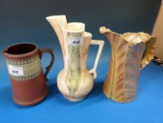 A group of three ceramic jugs to include Royal Worcester blush ivory,