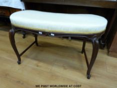 A kidney shaped duet piano stool raised on cabriole legs (w90cm)