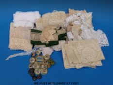 A quantity of 18th/19th century lace including lengths of ribbons and edging