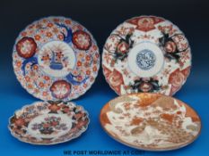 A Japanese Kutani charger (31.5cm diamter) and three Imari chargers (largest 31.