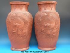 A pair of 19thC Japanese terracotta floor vases with dragon decoration (50cm tall)