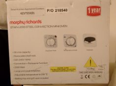 A Morphy Richard stainless steel counter top electric convection oven with a capacity of 28 litres