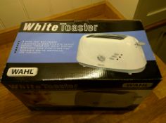 Wahl two slice toaster, unused and it its original box and packaging.