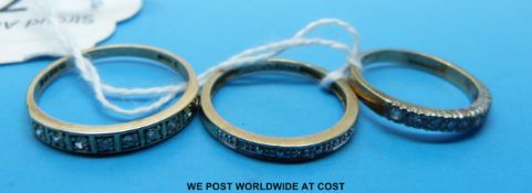 Three 9ct gold rings set with diamonds