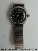 Jeager Le Coultre gentleman's military wristwatch with stainless steel case, black face,