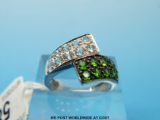 A 9ct white gold diopside and topaz ring (size N)