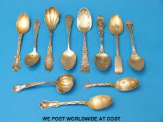 A quantity of hallmarked silver and white metal commemorative and similar spoons,