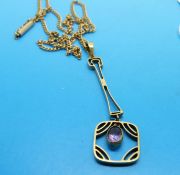 A 9ct gold pendant set with an oval amethyst on a 9ct gold chain