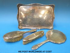 A hallmarked silver dressing table tray and dressing table set (width 29.