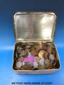 A tin of mixed coins,