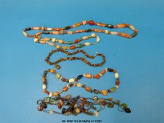 Four beaded necklaces made up of various gems to include carnelian agate,