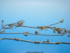 A quantity of yellow metal necklaces marked 9ct / 375,