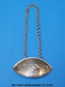 A Georgian hallmarked silver Brandy bottle label,