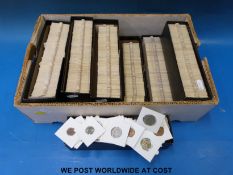 Approximately 1400 plus uncirculated world coinage in slips Commonwealth choice uncirculated
