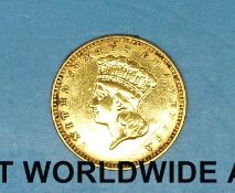 A gold 1856 American dollar coin
