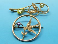 Two Edwardian 9ct gold brooches set with amethysts,