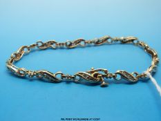 A 9ct gold bracelet set with diamonds