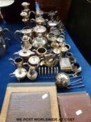 A quantity of silver plate to include cased cutlery, teaware, candelabra,