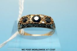 A 9ct gold ring set with sapphires and diamonds (size P)