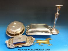A collection of plated ware including candlestick and pin tray,