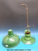 A green enamel gas lamp together with a similar shade