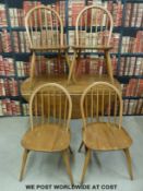 Ercol light elm retro table and four chairs with original cushions (H72 x W110 x max L124cm)