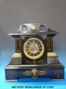A French 19thC slate mantel clock with open escapement and cameo decoration