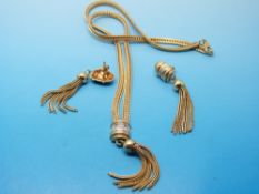 A 9ct gold necklace of rope and tassel design,